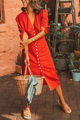 Vestido con mangas con nudo y botones